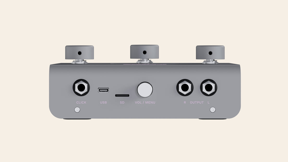 A piece of cake back panel: click output, USB-C, SD card slot, volume and menu knob, stereo outputs