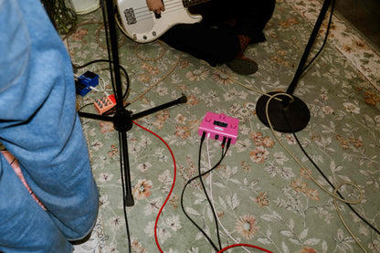 A piece of cake backing track player on a carpet