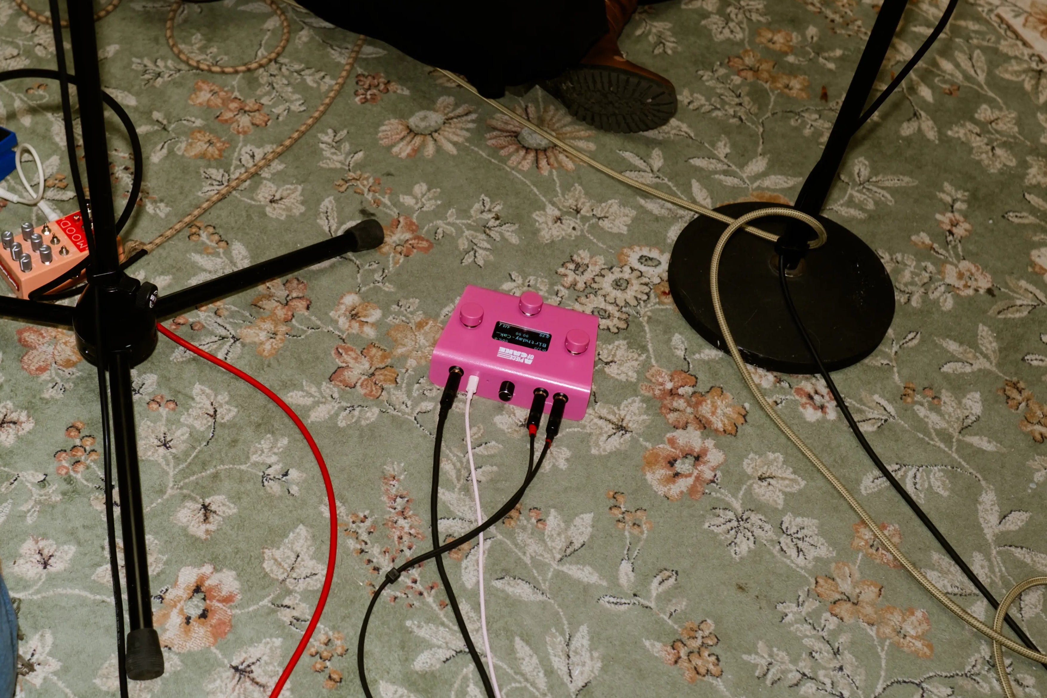 A piece of cake backing track player on the floor