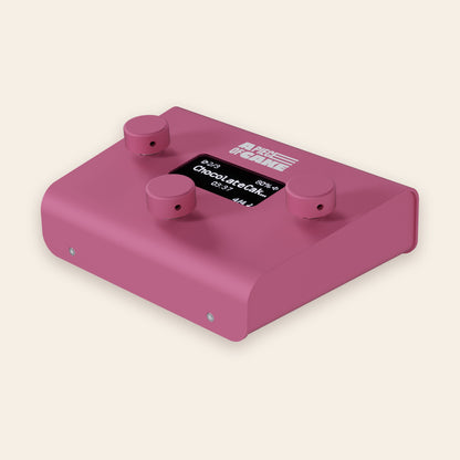 A piece of cake backing track player in pink, angled view