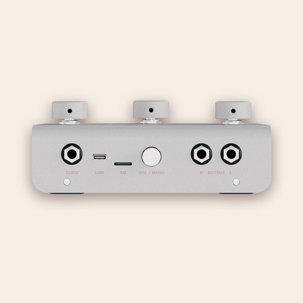 A piece of cake back panel in silver: click output, USB-C, SD card slot, volume and menu knob, stereo outputs